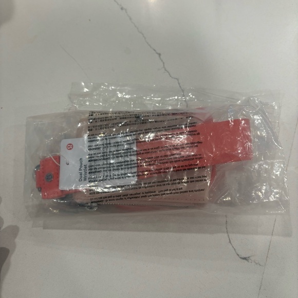 LULULEMON DUAL POUCH WRISTLET IN *wordmark* WASHED MAUVE/SAKURA PINK COMBO - Picture 8 of 8